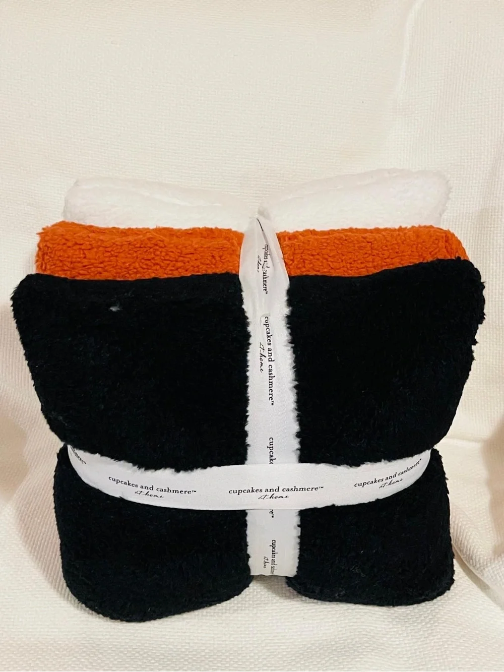 cupcakes & cashmere White Plush Throw with Black & Brown Accents